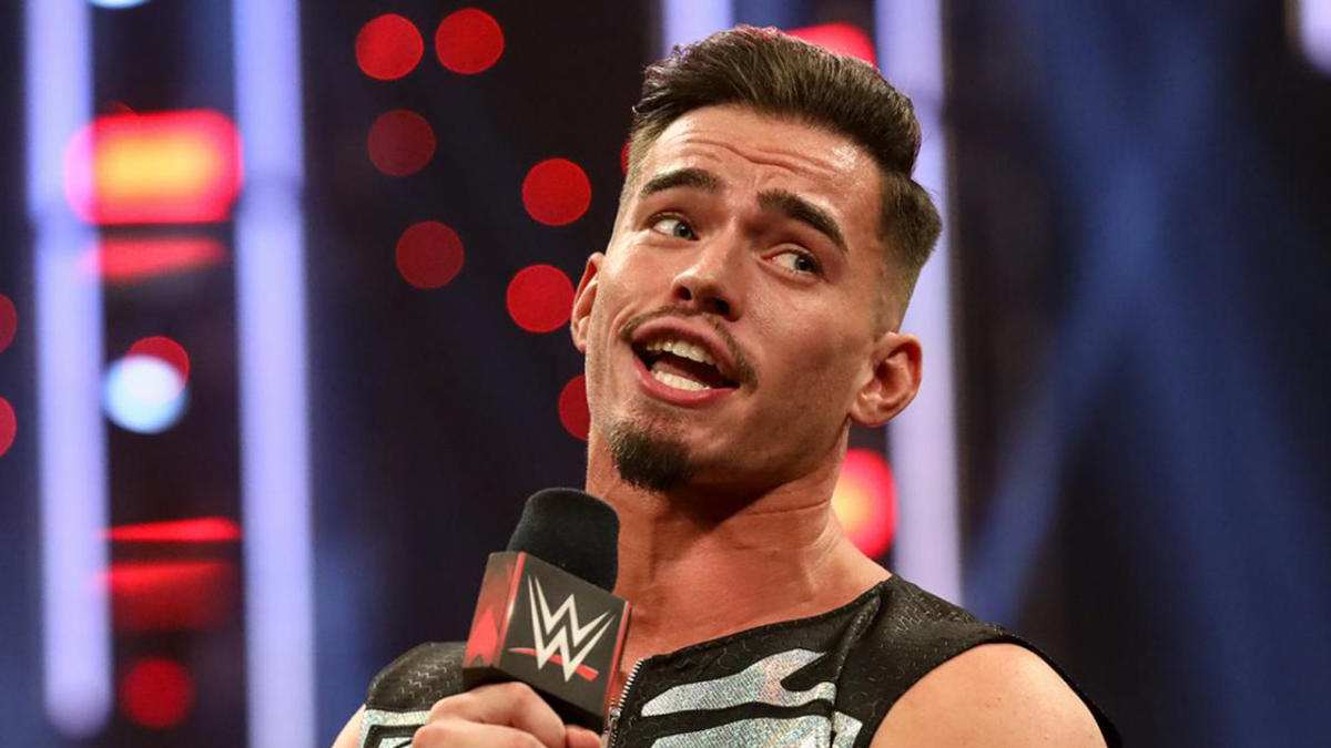 Austin Theory performing signature move in WWE ring